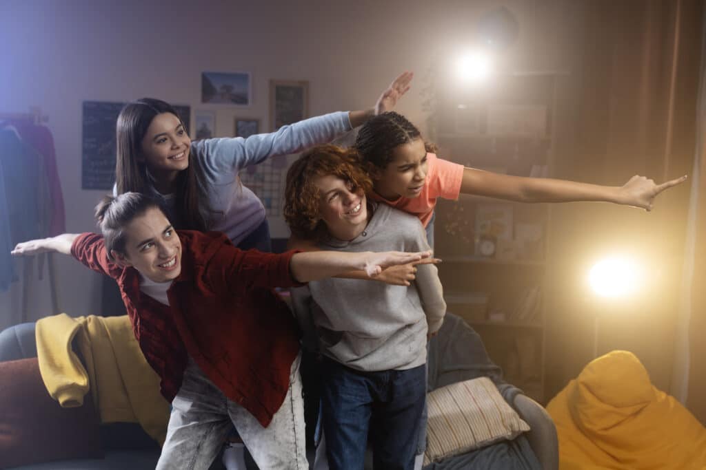 group-teenage-friends-posing-together-home-party